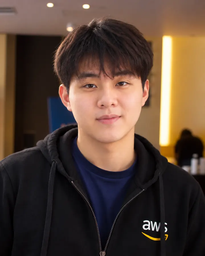 Cole Jordan in a black AWS hoodie.